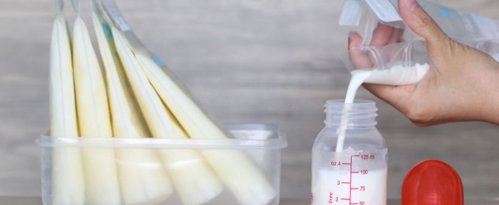 how to defrost breast milk in bottle warmer